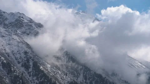 Mountain peaks in the clouds Stock Footage 164347350