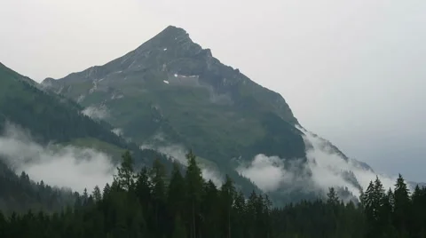 Mountain peaks of high tauern in cloudscape 스톡 동영상 67756620