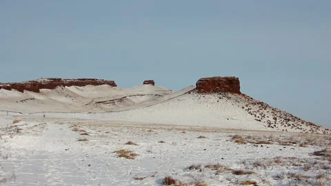 Mountain Peaks in Middle of Steppe. Time Destroyed Mountains. Herd of Sheep Stock Footage 146947707