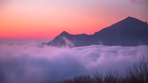 Mountain peaks over the fog Stock Footage 149380290