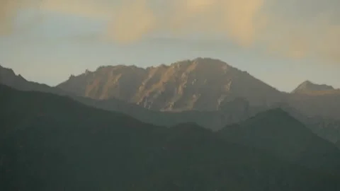 Mountain Peaks at Sunset Stock Footage 338118779