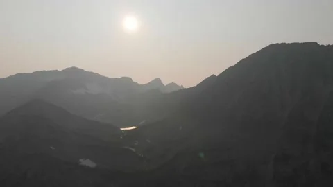 Mountain peaks in thick smoke Stock Footage 166420670