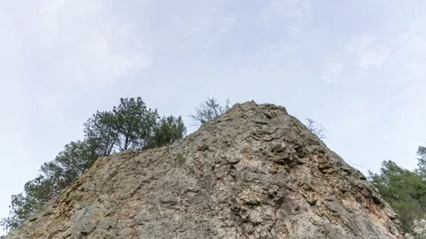 Mountain peek against cloudy sky 스톡 동영상 224530648