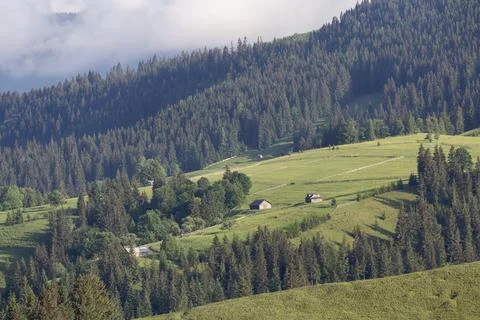 Mountain plain is flooded with sunlight Stock Photos