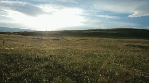 Mountain plateau. Small hill in the background. Sunset Stock Footage 8559545