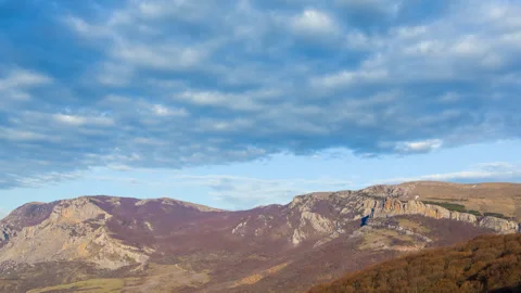 Mountain plateau under blue cloudy sky Stock-Footage 337189929