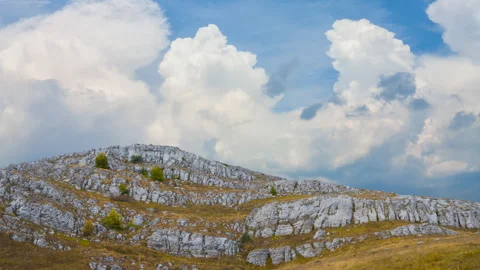 Mountain plateau under dense cumulus clouds Stock Footage 315128530