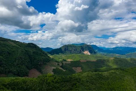 Mountain plateau under dramatic clouds, Laos 写真素材
