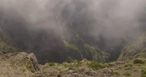 Mountain precipice and flowing clouds, 4K Stock Footage 246380185