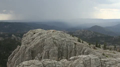 A mountain rain storm on the horizon Stock Footage 40570466