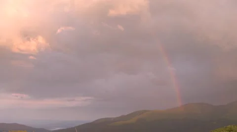 Mountain Rainbow Dramatic Light 4K Stock Footage 64212059