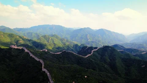 Mountain ramparts crossing deep shadowed valleys at the Great Wall Stock Footage 346575965