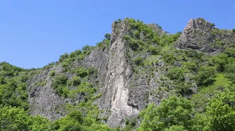 Mountain range against the blue sky Stock Footage 52879049