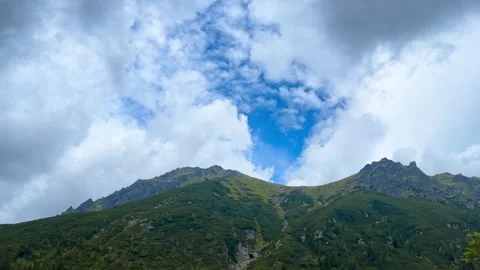 Mountain range and moving clouds. Stock Footage 276189423