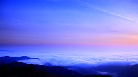 Mountain Range and Sea of Clouds Towards Asama from Myoko Mountain at Sunrise Vídeos de archivo 330310141