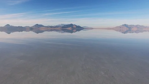 Mountain Range and Sky Reflection in the Flooded Salt Flats of Bonneville Stock-Footage 123777362
