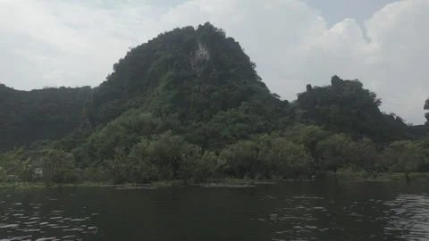 Mountain range beside Tam Coc river Stock Footage 290133014