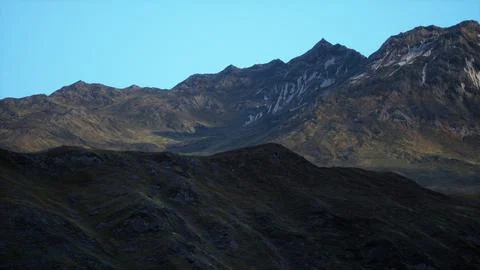 A mountain range with a blue sky in the background Stock Illustration