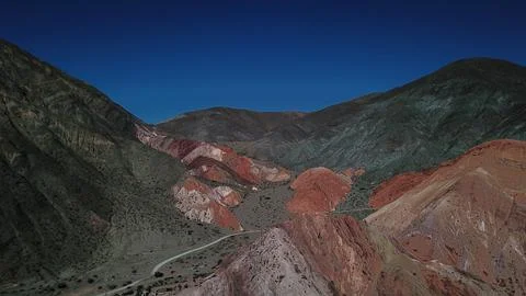 A mountain range with a blue sky in the background Foto stock