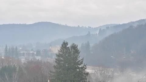 Mountain range bradford clock tower in the rainy fogy day Stock Footage 266514131