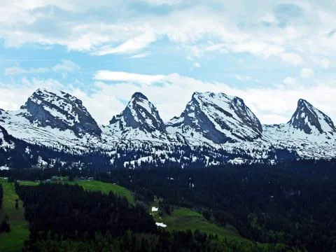 Mountain range Churfirsten in early spring; between valleys Thurtal and Seeztal Stock Photos
