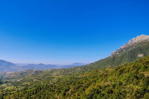A mountain range with a clear blue sky in the background on the island of S.. Stock Photos