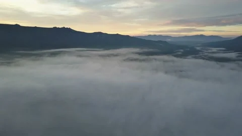 Mountain range in the clouds Stock Footage 108493062