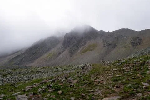 Mountain range in the clouds. Stock Photos