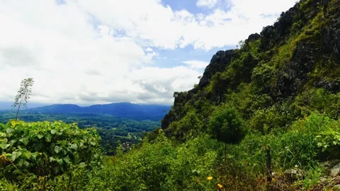 A mountain range with a cloudy sky in the background Video stock 277705163