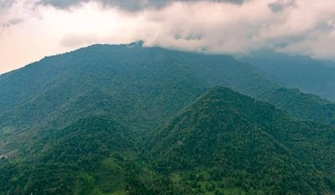 Mountain range with cloudy sky at morning from flat angle 스톡 사진