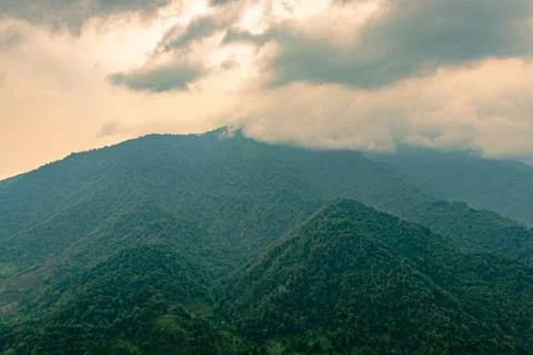 Mountain range with cloudy sky at morning from flat angle 写真素材