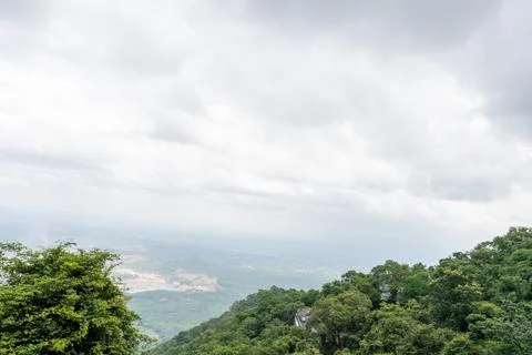 A mountain range with a cloudy sky Photos