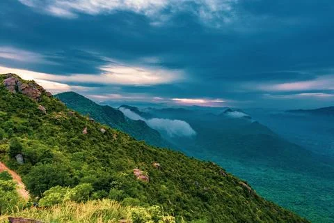 A mountain range with a cloudy sky 写真素材