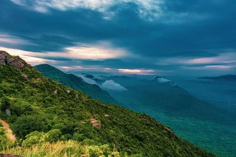 A mountain range with a cloudy sky 写真素材
