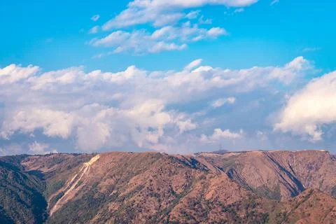 Mountain range covered with bright blue sky at afternoon from different angle Foto stock
