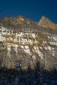 The mountain range is covered with freezing icicles. Stock Photos