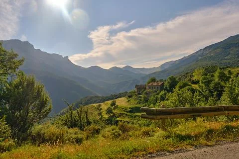 A mountain range covered with greenery Stock-Fotos