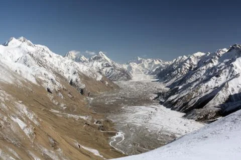 Mountain range covered in snow. Stock Photos