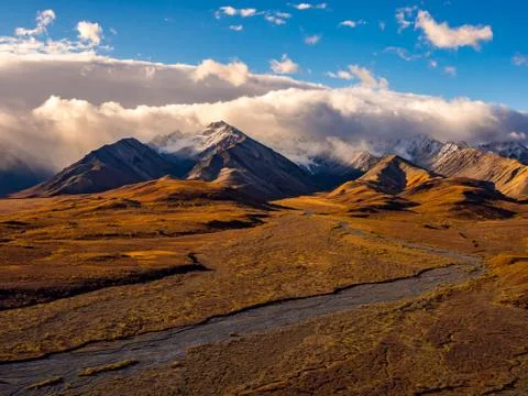Mountain Range in Denali, Braided River and Tundra in Autumn, Alaska Stock Photos
