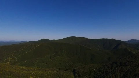 The mountain range extended and cobalt blue sky in akiragi ,aerial Stock Footage 108822662