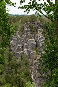 A mountain range with a forest in the background Stock Photos