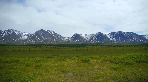 Mountain Range with Green Field Stock Footage 37393388
