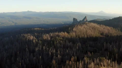 A mountain range with a large rock in the middle Stock Footage 272659950