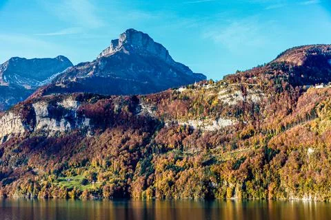 A mountain range with a Lucerne lake in the foreground Stock Photos