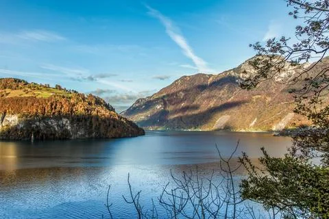 A mountain range with a Lucerne lake in the foreground Stock Photos