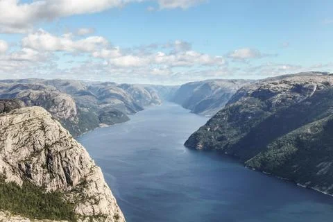 A mountain range in Norway overlooking the Luse Fjord from the Preikestolen.. Foto stock