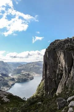 A mountain range in Norway overlooking the Luse Fjord and the Preikestolen .. Stock Photos
