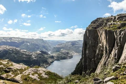 A mountain range in Norway overlooking the Luse Fjord and the Preikestolen .. Stock Photos