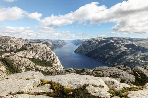 A mountain range in Norway overlooking the Luse Fjord from the Preikestolen.. Foto stock