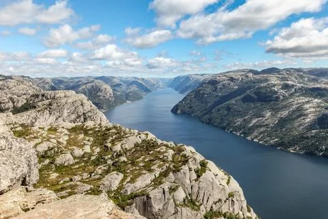 A mountain range in Norway overlooking the Luse Fjord from the Preikestolen.. Foto stock